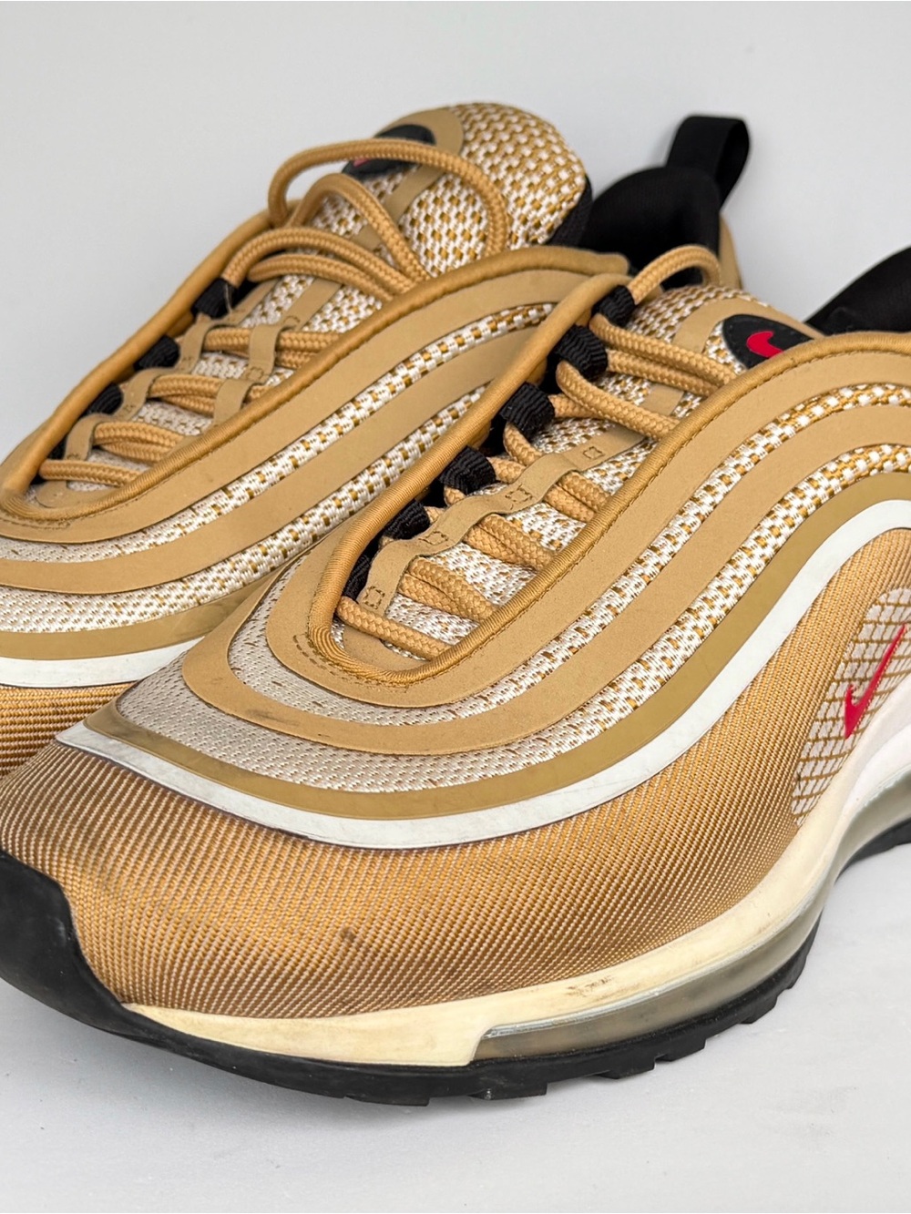 Nike Gold and White Air Max 97 Sneakers with Red Swoosh